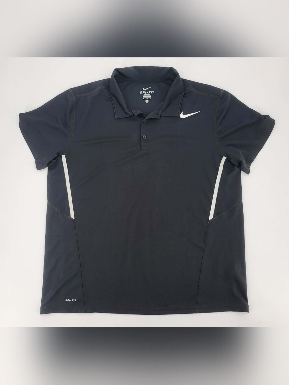 Nike Black Polo with White Swoosh and White Side Piping